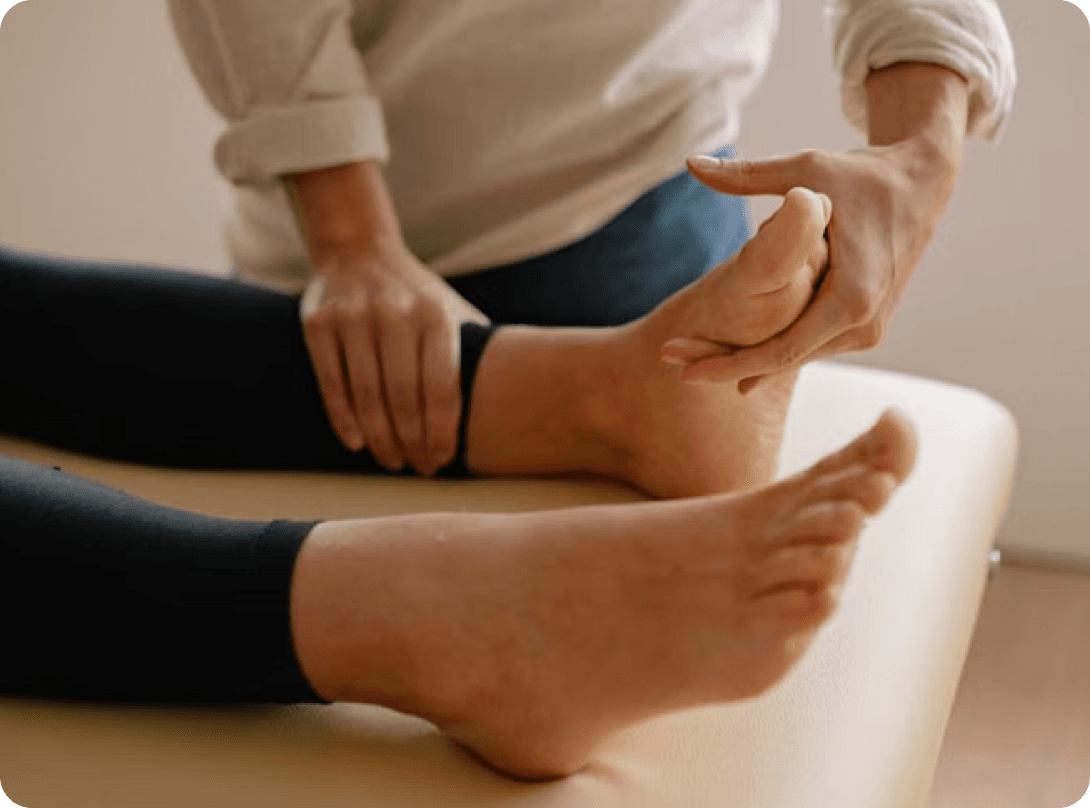Podiatrist examining a patient’s foot